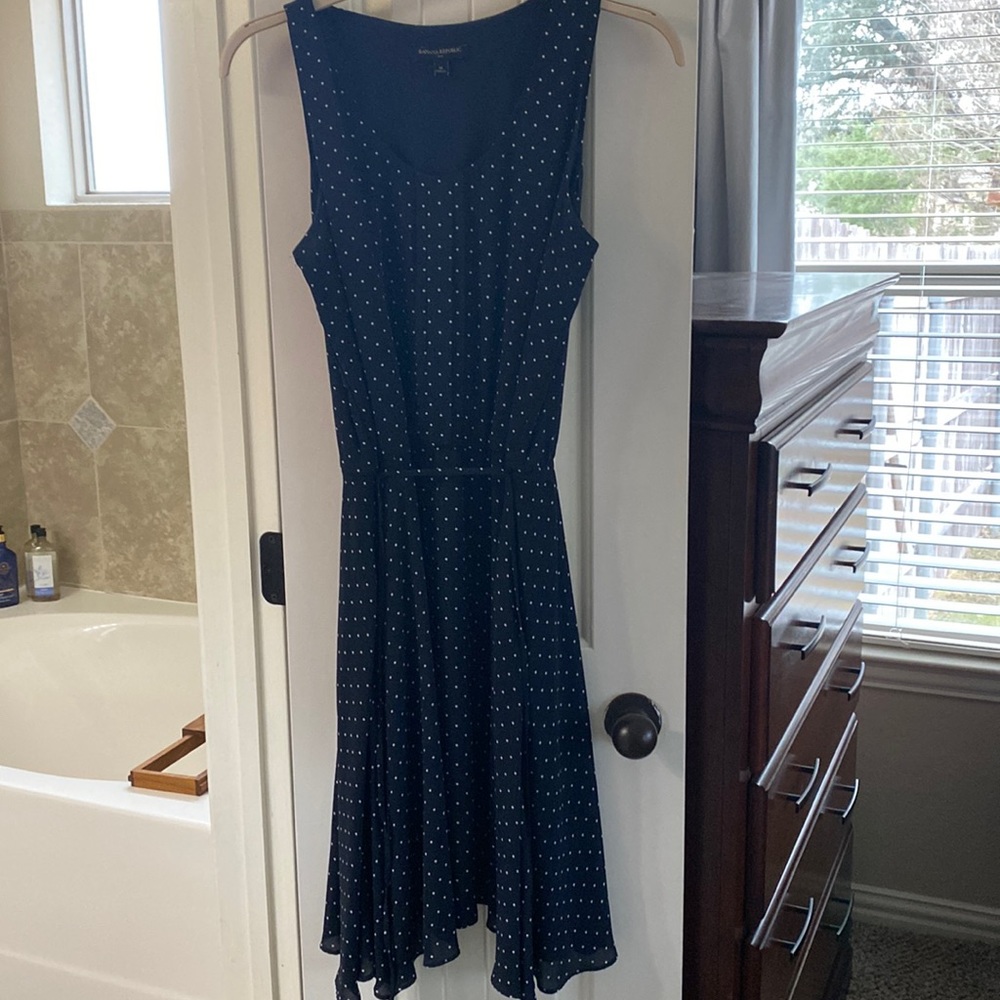 Navy and white polka dot sleeveless dress